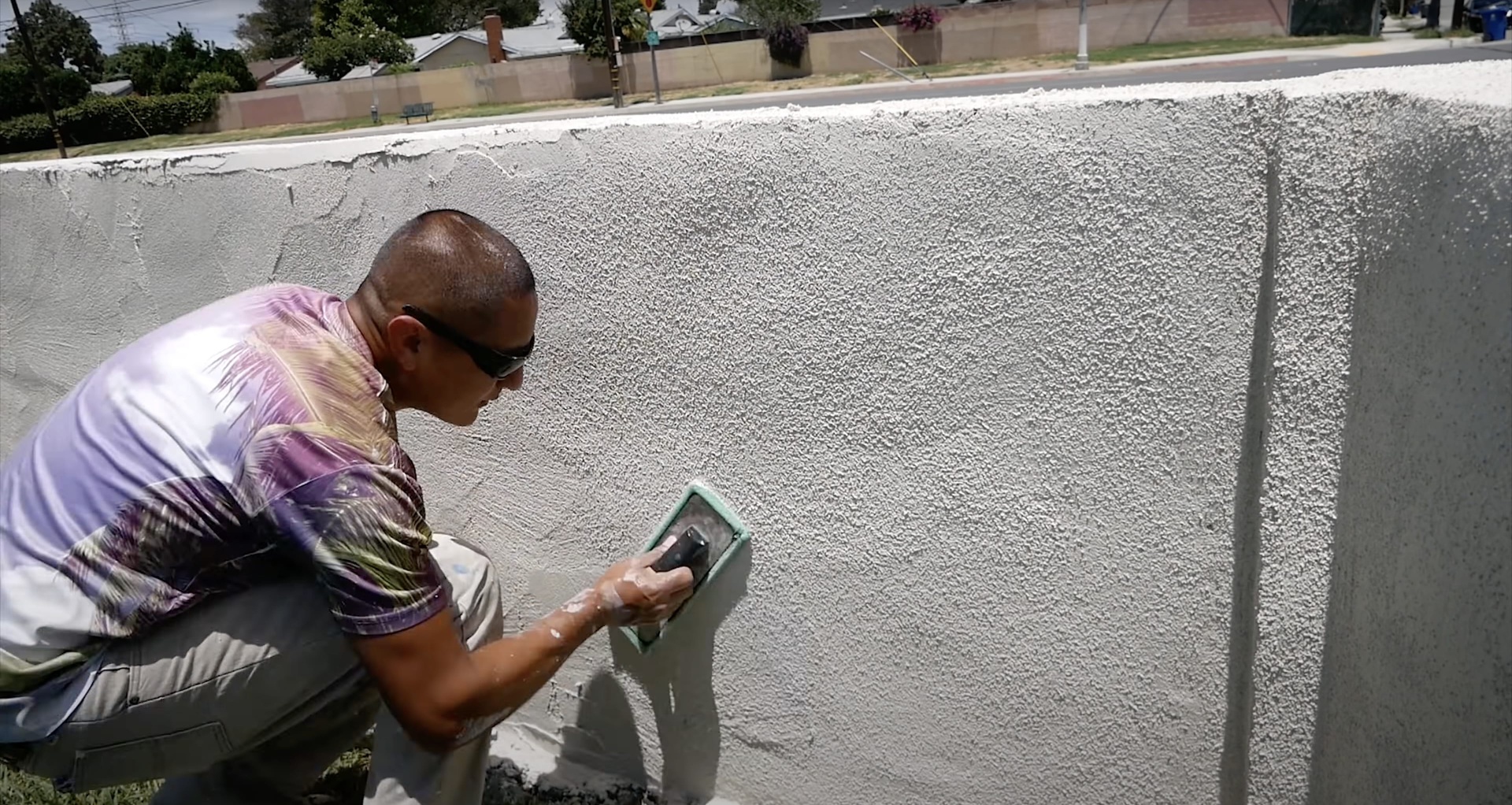 Commercial concrete slab finishing by experienced contractor Concrete contractor finishing large commercial concrete slab with professional tools